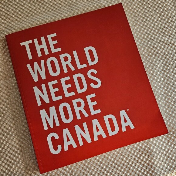 4/$40 Indigo - The‎ World Needs More Canada Book - Paperback - Picture 1 of 8